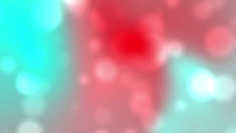 Red and turquoise blurred circles form a gentle backdrop Stock Footage 293649405