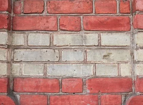 Red and white brick pattern. Old brick wall with cracks and scratches. Brickw Stock Photos
