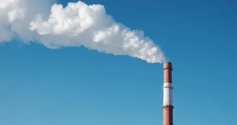 Red and white brick pipe of a thermal power station with white smoke. Stock Footage 168355844