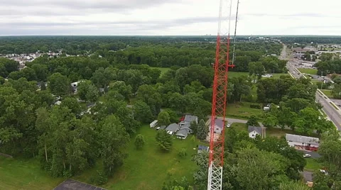 Red and white broadcast tower aerial view moving up Stock Footage 49752732
