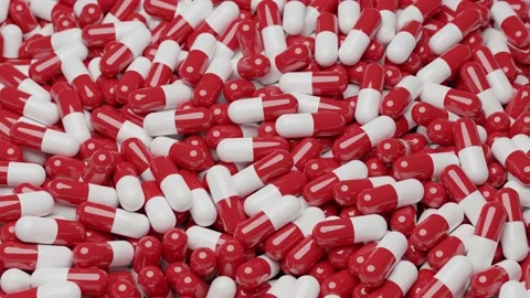 Red and white capsules production. Pharmaceutical and medicine business conce Stock Footage 150219941