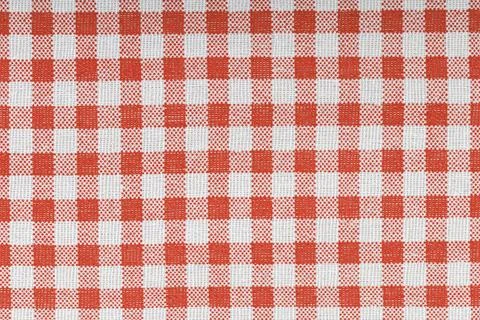 Red and white checkered, pattern, design, cotton fabric for sewing, texture.. Stock Photos