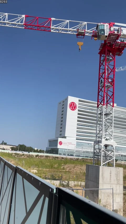 Red and white Construction cranes at Milano Innovation District, close to IRCCS Stock Footage 250061250