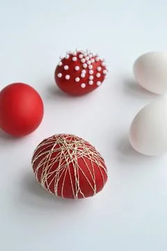 Red and White Easter Eggs Decorated on White Background. Stock Photos