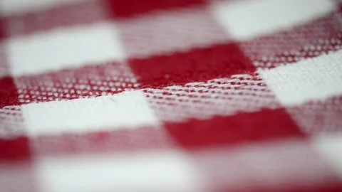 Red and white gridded tablecloth Stock Footage 126926084