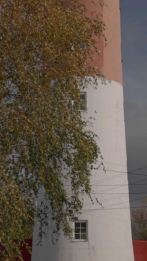 The red and white lighthouse in Baltiysk is one of the westernmost in Russia. Stock Footage 332424331