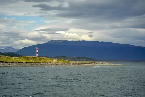 Red and White Lighthouse on Beagle Channel Shore Ushuaia Stock Photos