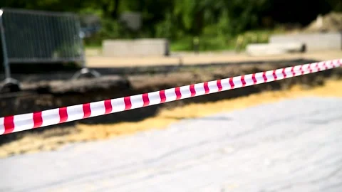 Red and white lines of the barrier tape. Stock Footage 254908696