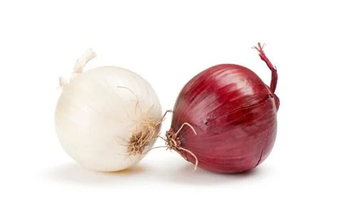 Red and white onions on a white background Stock Photos