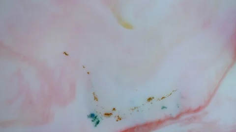 Red and white paints spread out. Video Stock Footage 123777873