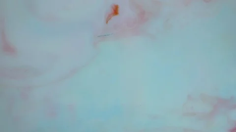 Red and white paints spread out. Video Stock Footage 123777887