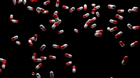 Red and White Pills with Alpha Stockbeeldmateriaal 128738543
