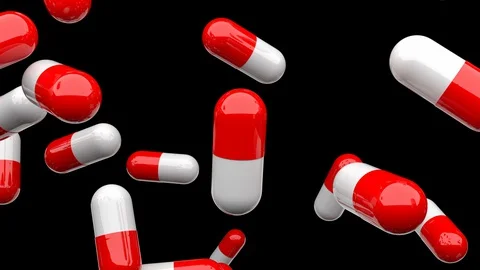 Red and White Pills with Alpha Stockbeeldmateriaal 128742363