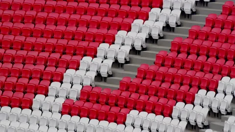 Red and white seats for viewers near aisles on tribune Stock Footage 229843402