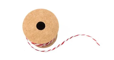Red and white string twine rope role for christmas gifts Fotos de archivo