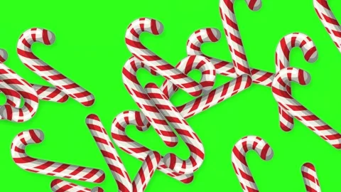 Red and White Striped Candy Canes Falling on Green Screen Background Stock Footage 345703497