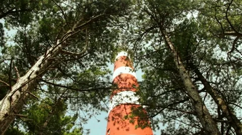 Red and white striped lighthouse Stock Footage 8646086