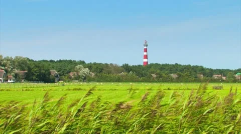 Red and white striped lighthouse Stock Footage 8836634