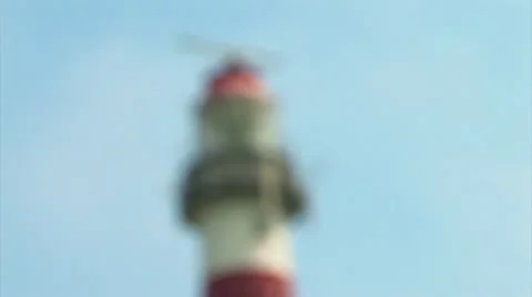 Red and white striped lighthouse Stock Footage 8836780