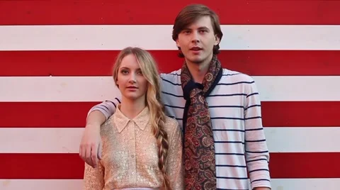 Red and White Striped Wall With Models Stock Footage 50242073