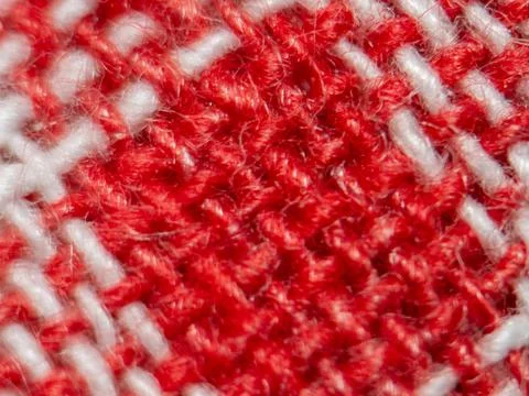 Red and white textile macro with woven yarn texture pattern 스톡 사진