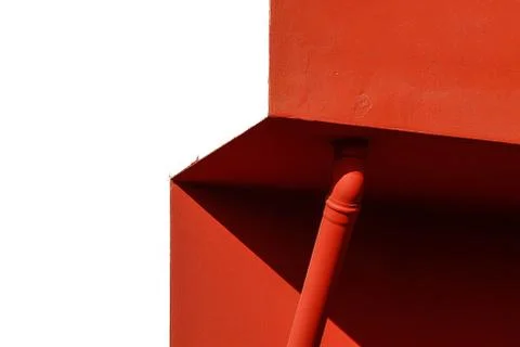 Red and white wall with gutter Stock Photos