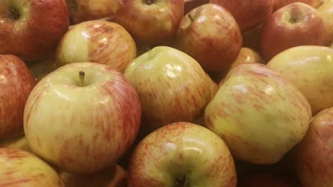 Red and yellow apples displayed at a vegetable stall Stock Footage 165107961