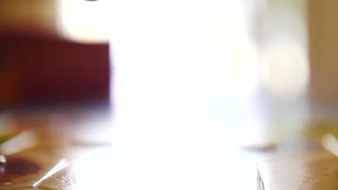 Red and yellow dice being rolled in slow motion playing a board game Video stock 207340685