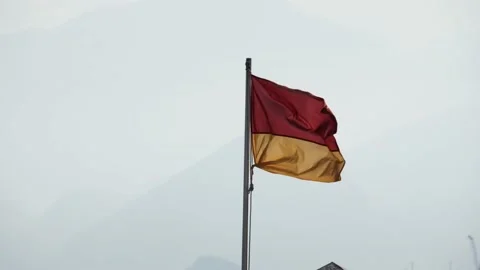 Red and yellow flag on the beach. The red over yellow flag-recommended swimming Stock Footage 220889082