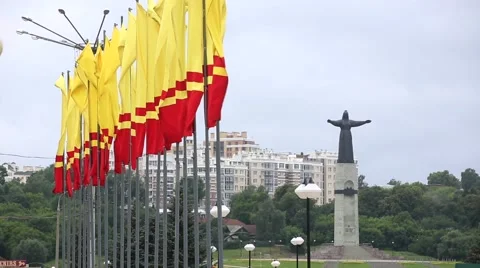 Red and yellow flags waving in a windy day. Stock Footage 57095844