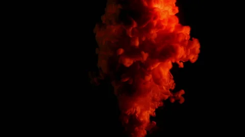 Red and yellow ink ascending like in a big explosion, black background Stock Footage