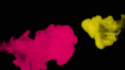 Red and yellow ink drops into water on black isolated background Stock Footage 217443301