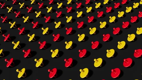 Red and yellow pacifiers loop Stock Footage 265248448