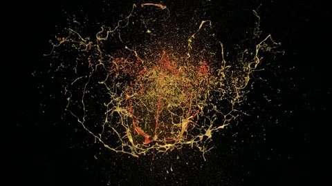 Red and yellow paint explodes and splashes. Slow Motion. Stock Footage 72867116