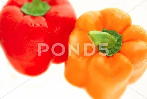 Red and yellow sweet pepper Stock Photos