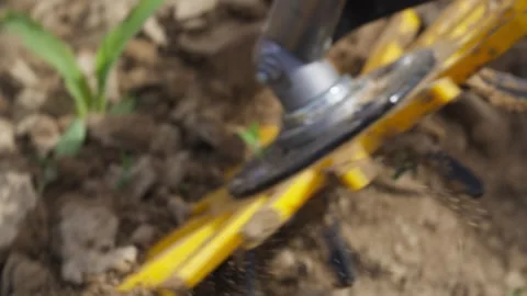 A red and yellow tool with a yellow handle Stock Footage 296100107