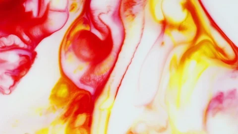 Red and yellow undulating paint shapes Stock Footage 92997194