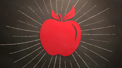 Red apple and chalk lines on blackboard Video stock 167440428