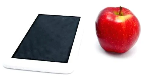 Red apple and tablet PC isolated Stock Photos