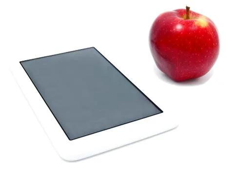 Red apple and tablet PC isolated Stock Photos