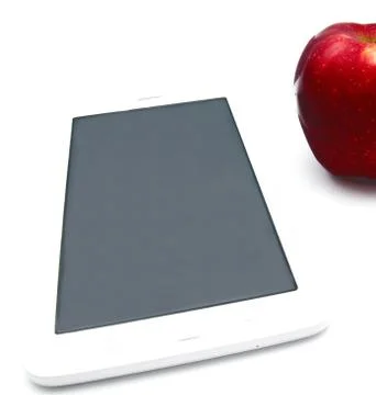 Red apple and tablet PC isolated Stock Photos