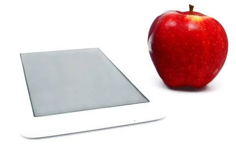 Red apple and tablet PC isolated Stock Photos