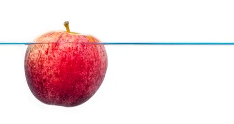 Red apple and water splash isolated on white Stock Photos