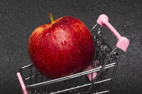 Red apple in basket Stock Photos