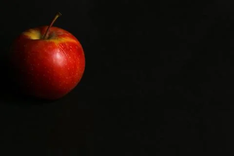 Red Apple on black backdrop Stock Photos