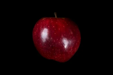 Red apple on black background Stock Photos