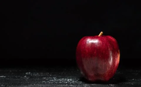 Red Apple on black background Stock Photos