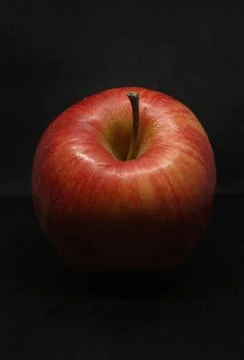 Red apple on a black background Stock Photos