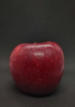 Red apple on a black background Stock Photos