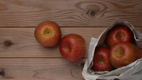 Red Apple on Board. Stock Footage 153982575